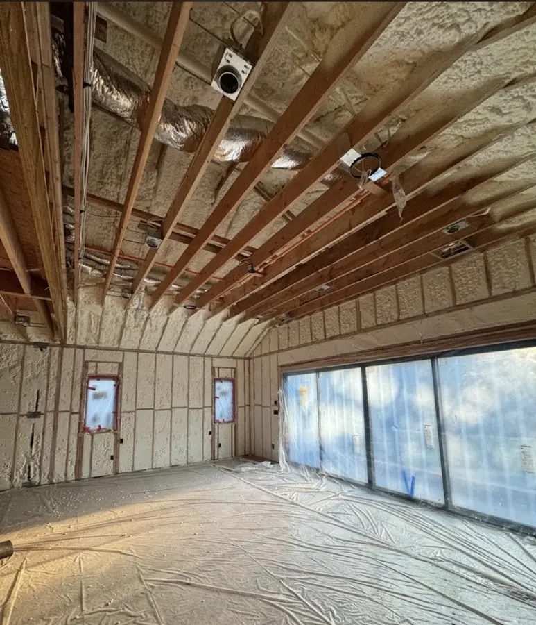 Interior walls and ceiling insulated with spray foam during new construction in Azusa